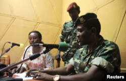 Major General Godefroid Niyombare addresses the nation inside the Radio Publique Africaine (RPA) broadcasting studios in Burundi's capital Bujumbura, May 13, 2015.