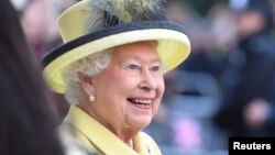 FILE - Queen Elizabeth II visits Goodenough College, the leading residential community for British and international postgraduate students studying in London, Britain December 1, 2016.