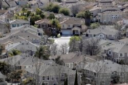 FILE: Homes close together in a San Jose, California neighborhood.
