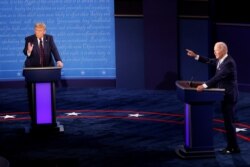 Debat pertama Presiden AS Donald Trump dan penantangnya, Joe Biden di Cleveland, Ohio (29/9).