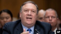 Secretary of State Mike Pompeo appears before the Senate Foreign Relations Committee as lawmakers demand specifics from him on President Donald Trump's meeting with Russian leader Vladimir Putin in Helsinki last week, on Capitol Hill in Washington, July 25, 2018.