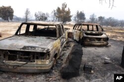 This photo provided by the Santa Barbara County Fire Department shows Rancho Alegre Outdoor School, a camp that suffered extensive damage from the Whittier Fire near Santa Barbara, Calif., July 7, 2017.