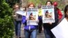 Activists rally in Washington, D.C., for human rights around the world on annual "Get on the the Bus Day," sponsored by Amnesty International USA, April 12, 2013.