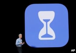 Craig Federighi, Apple's senior vice president of software engineering, speaks about the company's "Screen Time" feature during an announcement of new products at the Apple Worldwide Developers Conference, June 4, 2018, in San Jose, Calif.