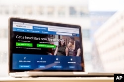 FILE - The HealthCare.gov website, where people can buy health insurance, is displayed on a laptop screen in Washington.