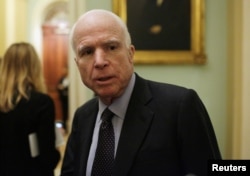 Senator John McCain (R-AZ) speaks to reporters after the Senate voted to remove the filibuster rule for Supreme Court nominees, on Capitol Hill in Washington, April 6, 2017.