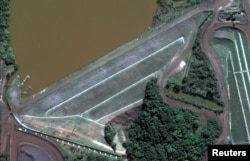 The dam at Vale's Corrego do Feijao mine near Brumadinho, Brazil, is pictured before its Jan. 25, 2019 collapse in this June 2, 2018 handout satellite photo.