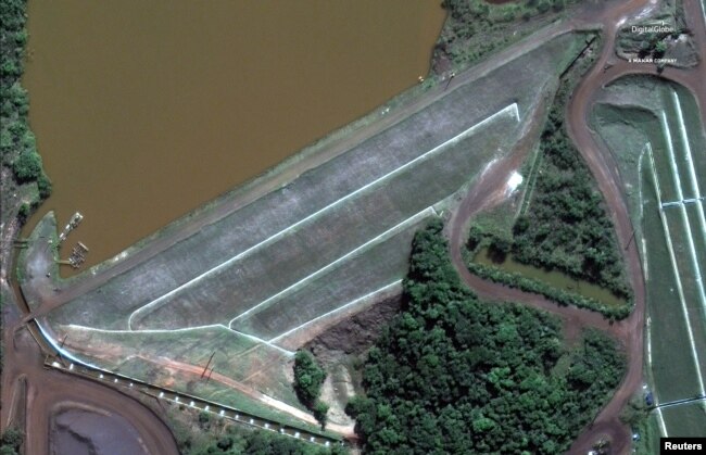 The dam at Vale's Corrego do Feijao mine near Brumadinho, Brazil, is pictured before its Jan. 25, 2019 collapse in this June 2, 2018 handout satellite photo.