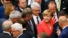 German Lawmakers Debate Greek Bailout, Merkel Faces Rebellion