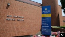 This July 8, 2014, photo shows the East Baltimore Medical Center, an affiliate of Johns Hopkins Hospital in Baltimore, where Dr. Nikita Levy worked when allegations he videotaped his female patients during pelvic exams came to light.