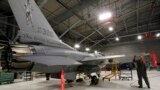 FILE - A U.S. F-16 fighter jet is seen in a hangar in South Burlington, Vermont.
