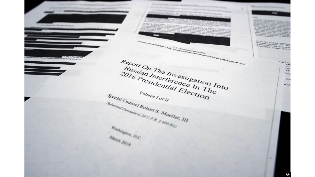 Four pages of special counsel Robert Mueller's report on the witness table in the House Intelligence Committee hearing room on Capitol Hill, in Washington, April 18, 2019.