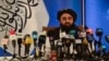 FILE - The Taliban's acting foreign minister, Amir Khan Muttaqi, speaks to the media in Kabul, Afghanistan, Sept. 14, 2021.