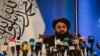 FILE - The Taliban's foreign minister, Amir Khan Muttaqi, speaks to the media in Kabul, Afghanistan, Sept. 14, 2021.