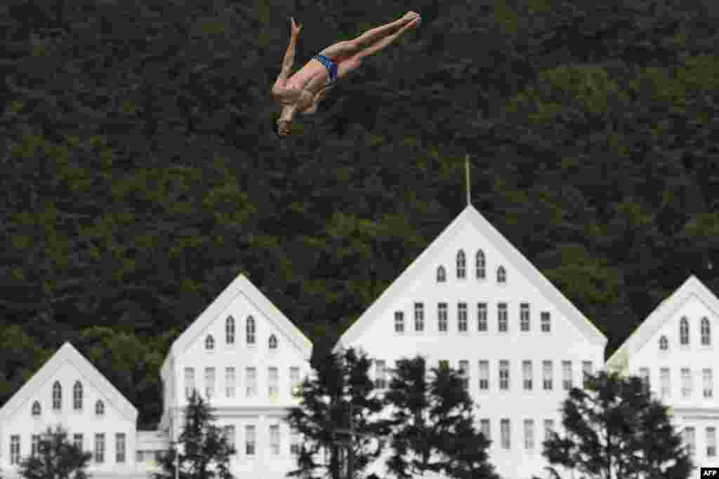 Britain&#39;s Gary Hunt competes in a round of the men&#39;s high diving event during the 2019 World Championships at Chosun University in Gwangju, South Korea.