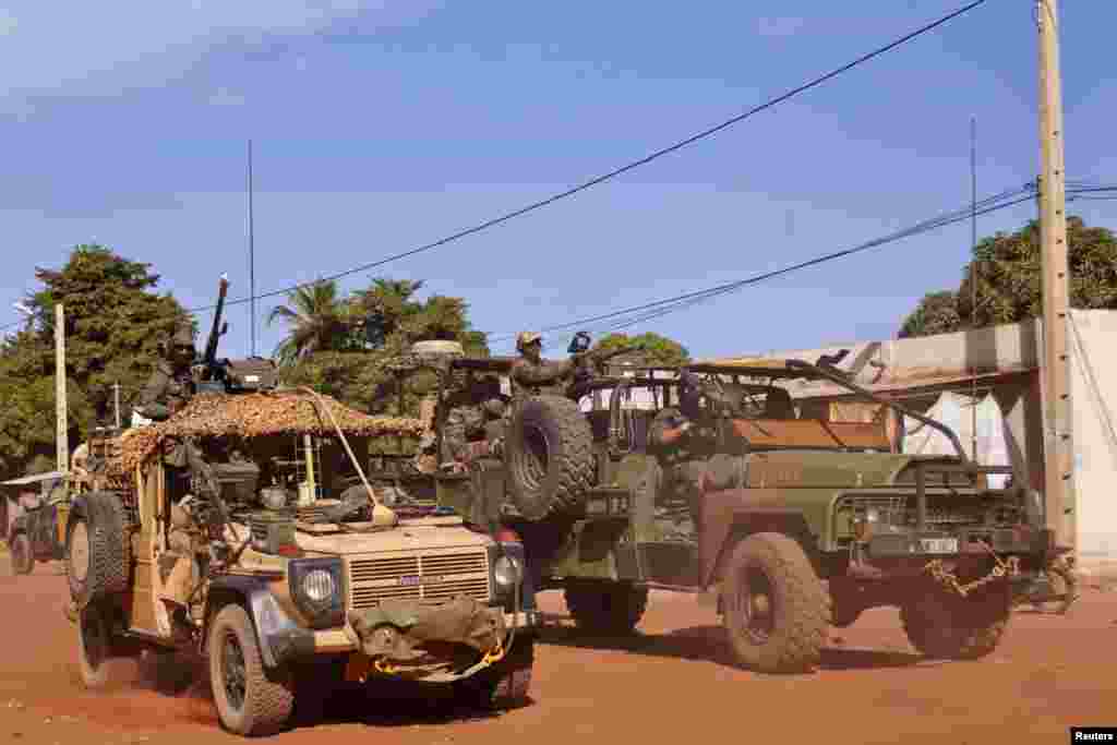 French Elite Special Operations soldiers drive through Markala, about 275 kilometers from Bamako, Mali, January 15, 2013.