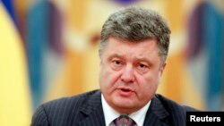 President Petro Poroshenko presides over a meeting of Ukraine's security council in Kyiv June 16, 2014.