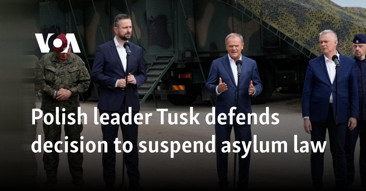 Polish leader Tusk defends decision to suspend asylum law