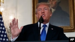 FILE - President Donald Trump makes a statement on Iran policy in the Diplomatic Reception Room of the White House, in Washington, Oct. 13, 2017.