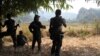 FILE - Soldiers of Karen National Union (KNU) stand guard in Hpa-an village, Karen State, Myanmar. 