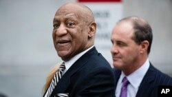 Bill Cosby departs the Montgomery County Courthouse after a pretrial hearing in his sexual assault case in Norristown, Pa. 