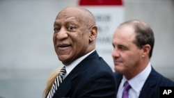 FILE - Bill Cosby departs the Montgomery County Courthouse after a pretrial hearing in his sexual assault case in Norristown, Pennsylvania. 