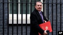 Britain's Secretary of State for International Trade Liam Fox leaves a Cabinet meeting at Downing Street in London, Jan. 15, 2019.