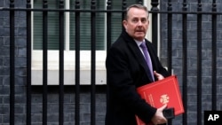 Britain's Secretary of State for International Trade Liam Fox leaves a Cabinet meeting at Downing Street in London, Jan. 15, 2019.