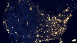 FILE - A NASA composite image from satellite data shows the United States lit up at night. Recent Supreme Court rulings have paved the way for a host of new technologies that are revolutionizing the electricity industry and creating an advanced "Smart Grid."