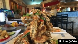 The salt and pepper crab is one of the popular dishes on the menu at the Houston-based restaurant, Crawfish & Noodles.