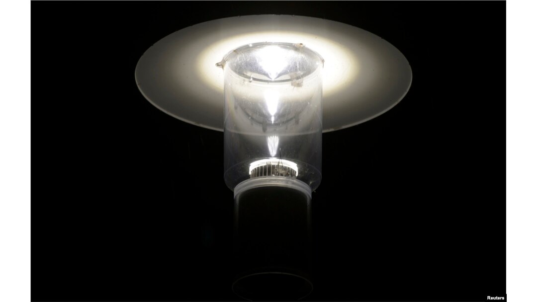 FILE - A light-emitting diode (LED) street lamp is illuminated in Langen, Lower Saxony. Experts say LED is not just environment-friendly; it helps consumers save money and enables the government to fill energy gaps.