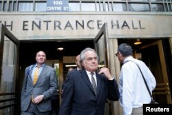 FILE - Benjamin Brafman, lawyer for film producer Harvey Weinstein, exits the Manhattan Criminal Court following a meeting in New York, May 29, 2018.