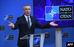 NATO Secretary General Jens Stoltenberg gestures as he talks during a press conference at the NATO headquarters in Brussels, Jan. 7, 2022.