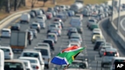 Traffic moves slowly near Soccer City Stadium in Johannesburg on the opening day of the 2010 World Cup football tournament in South Africa, 11 Jun 2010