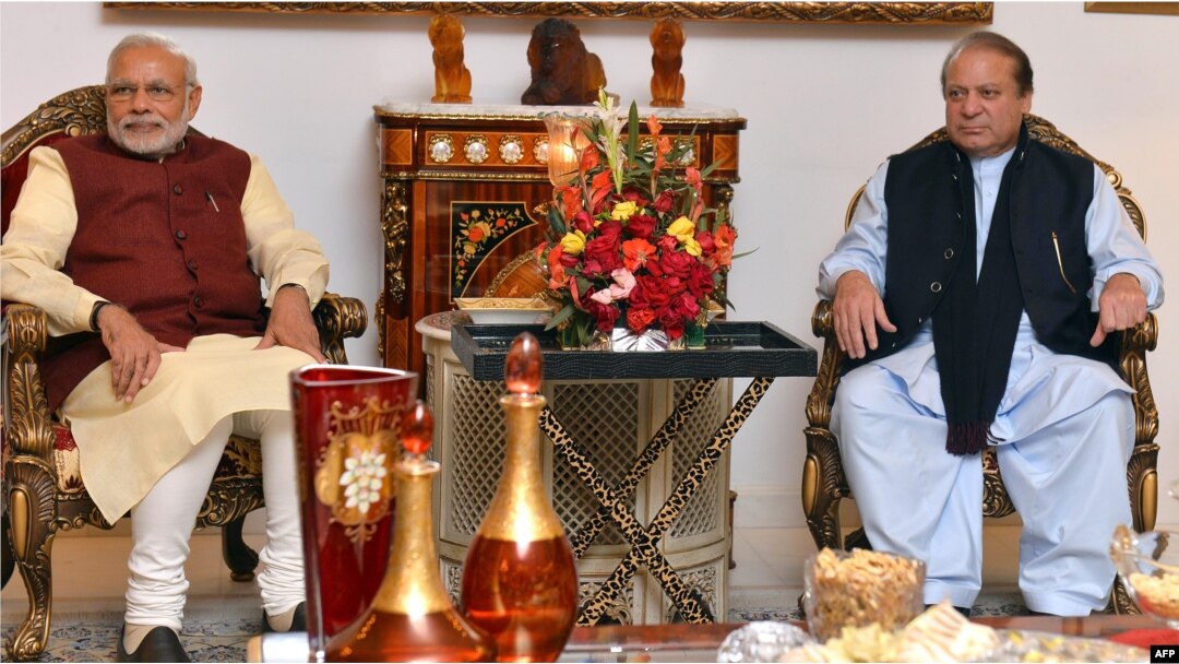 FILE - Indian Prime Minister Narendra Modi, left, and Pakistan Prime Minister Nawaz Sharif meet in Lahore after Modi paid a surprise visit, Dec. 25, 2015.