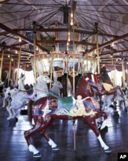 On Burlington, North Carolina's prized menagerie carousel, other animals - like these giant hares - share the limelight.