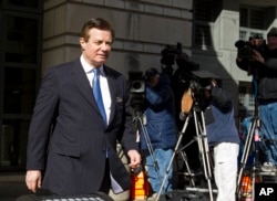 FILE - Paul Manafort, President Donald Trump's former campaign chairman, leaves the federal courthouse after his hearing in Washington, Feb. 28, 2018.