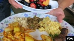 Fresh produce turns into a feast at Eco City Farms. (Rosanne Skirble/VOA)