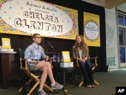 Chelsea Clinton, right, speaks with teen actress, author and magazine publisher Tavi Gevinson on Sept. 15, 2015, in New York.