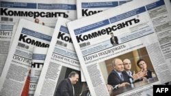 A picture taken on May 20, 2019, shows Kommersant daily newspaper issues. The paper's entire political desk, quit on Monday in protest over alleged censorship after two veteran reporters were fired.