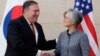 U. S. Secretary of State Mike Pompeo, left, shakes hands with South Korean Foreign Minister Kang Kyung-wha at South Korea's mission, July 20, 2018 in New York.