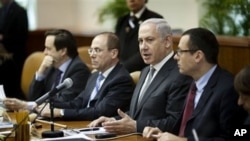 Israeli Prime Minister Benjamin Netanyahu, second right, at the weekly Cabinet meeting in Jerusalem, March 6, 2011