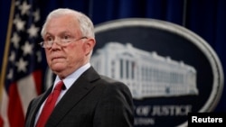 FILE - U.S. Attorney General Jeff Sessions is pictured at a news conference at the Department of Justice in Washington, Dec. 15, 2017. Sessions has ordered the creation of a task force to examine how his department can better combat cyberthreats.