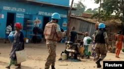 Peacekeepers serving in the United Nations Organization Stabilization Mission in the Democratic Republic of the Congo (MONUSCO) patrol the streets of Uvira, South Kivu, in the Democratic Republic of Congo, Sept. 30, 2017.