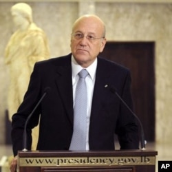 Lebanese Prime Minister designate Najib Mikati speaks during a press conference at the presidential palace in Baabda, east of Beirut, Lebanon, Jan. 25, 2011
