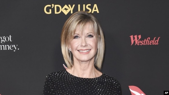 FILE - In this Jan. 27, 2018 file photo, Olivia Newton-John attends the 2018 G'Day USA Los Angeles Gala at the InterContinental Hotel Los Angeles. 