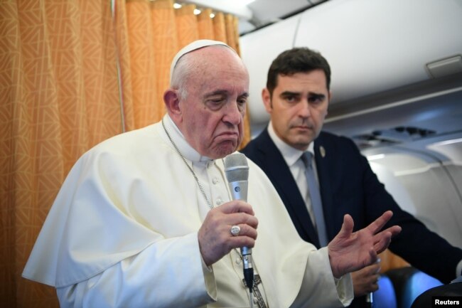 Pope Francis speaks to reporters during the flight from Skopje to Rome, at the end of his apostolic journey to Bulgaria and North Macedonia, May 7, 2019.