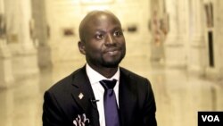 As "shadow" U.S. representative for the District of Columbia, Adeoye "Oye" Owolewa is pressing for Washington to become the 51st U.S. state. He’s shown at the municipal John A. Wilson Building in Washington, D.C. (Betty Ayoub/VOA) 