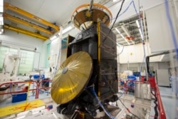 ESA's ExoMars Trace Gas Orbiter (TGO) and Schiaparelli, also known as the ExoMars Entry, descent and landing Demonstrator Module, are seen here during vibration testing at Thales Alenia Space, in Cannes, France, on 23 April 2015. (ESA)