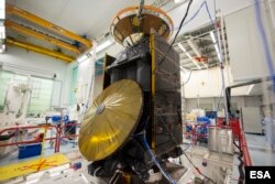 ESA's ExoMars Trace Gas Orbiter (TGO) and Schiaparelli, also known as the ExoMars Entry, descent and landing Demonstrator Module, are seen here during vibration testing at Thales Alenia Space, in Cannes, France, on 23 April 2015. (ESA)